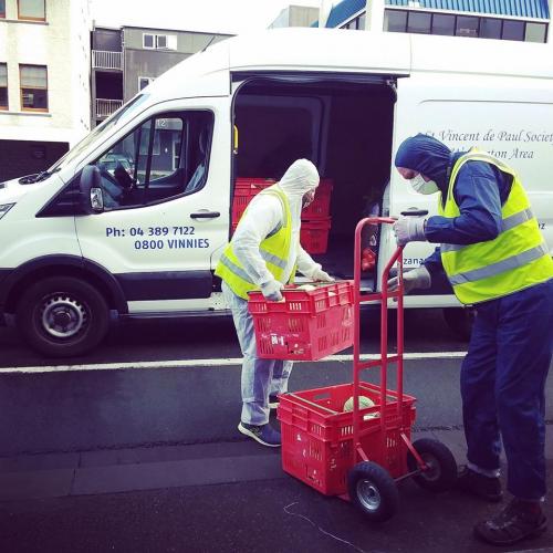 Auckland Vinnies volunteers loading food parcels for delivery2